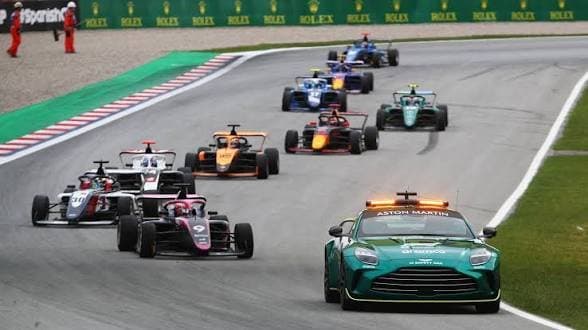 The safety car leading the field in a Formula 1 race